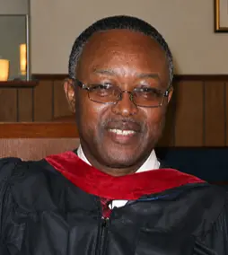 Portrait of Rev. Madison Clark, Jr. in a pulpit robe